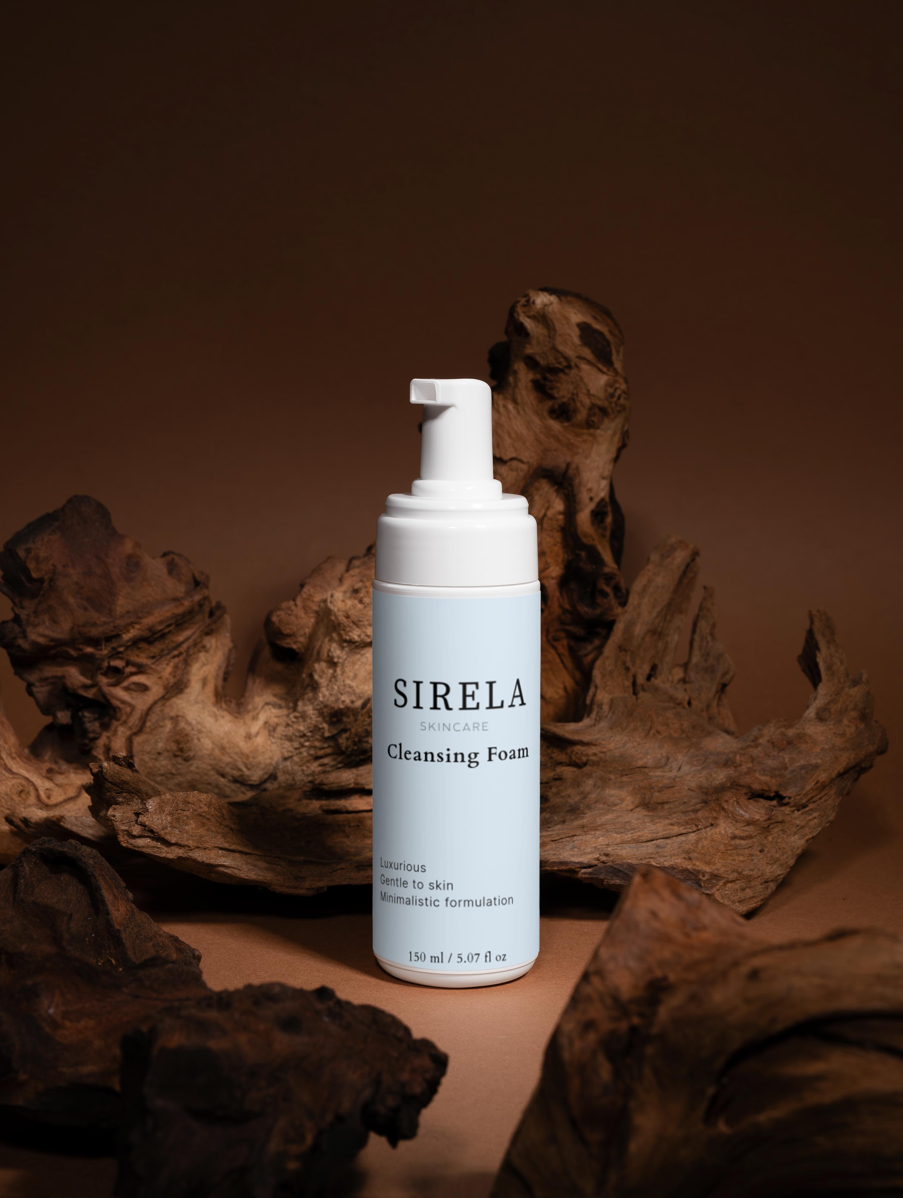 SIRELA Cleansing Foam bottle on a brown background with natural wood elements