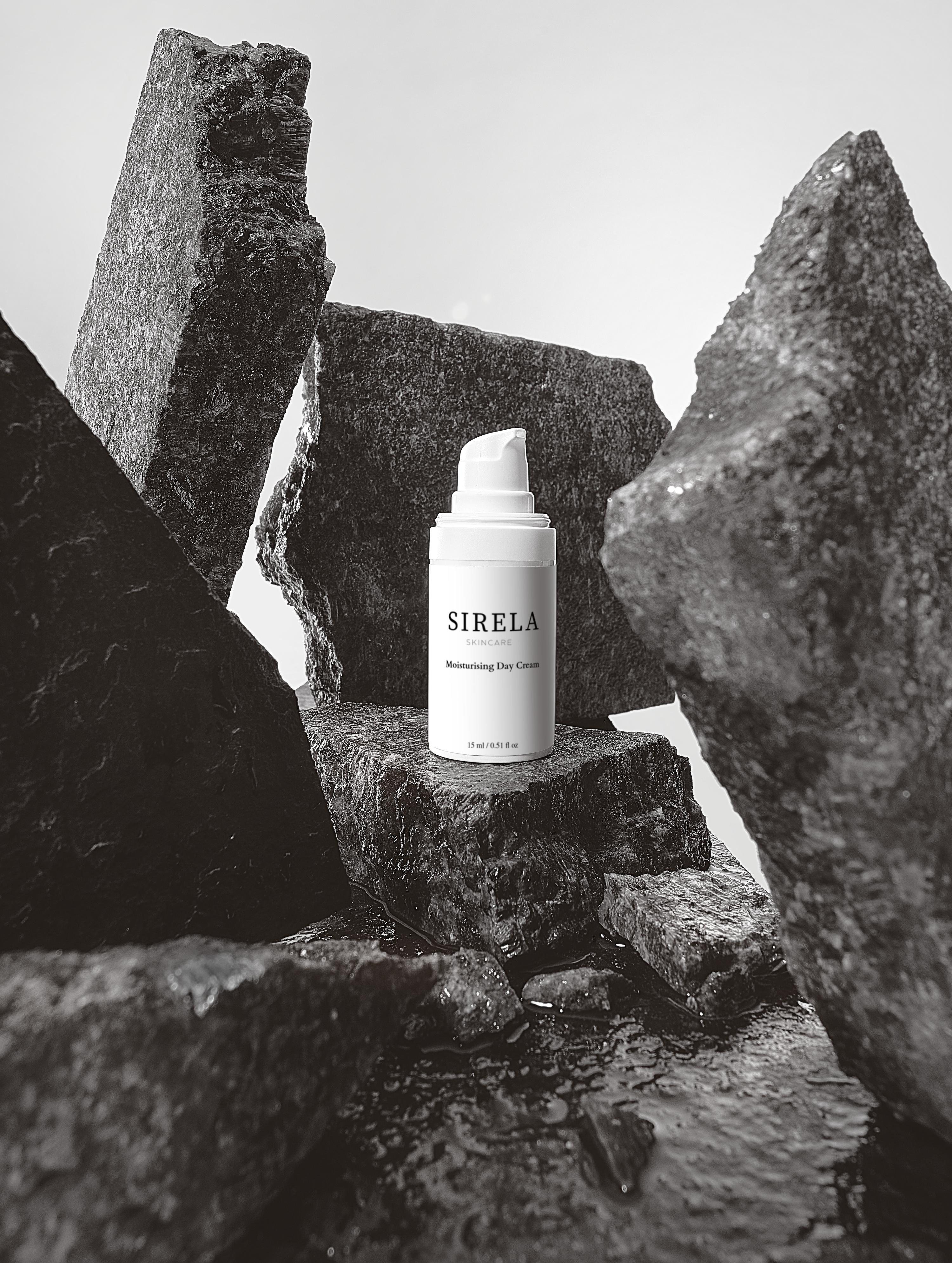 SIRELA skincare bottle on a stone surface with a minimal background