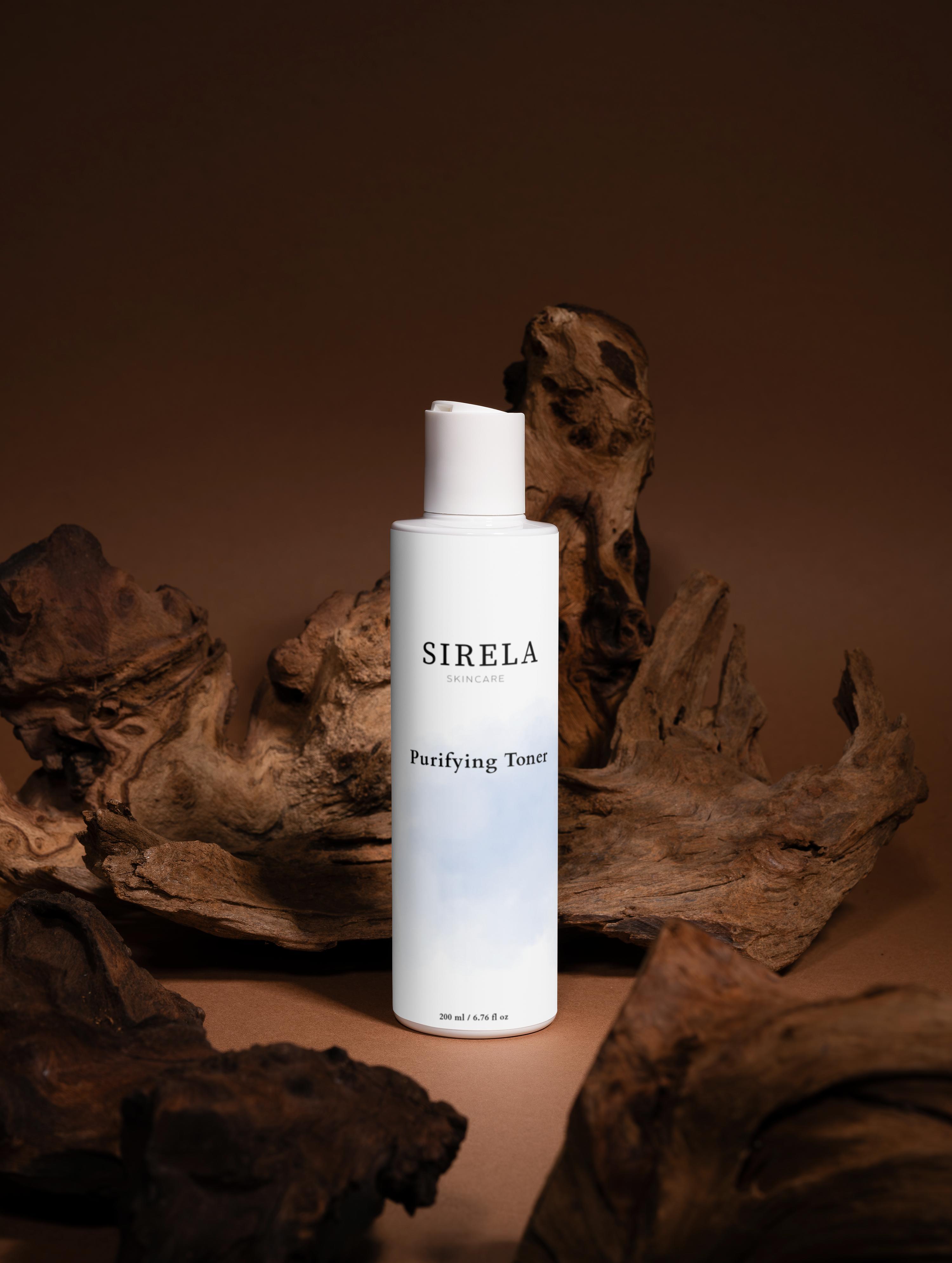 SIRELA skincare bottle on a brown background with natural elements