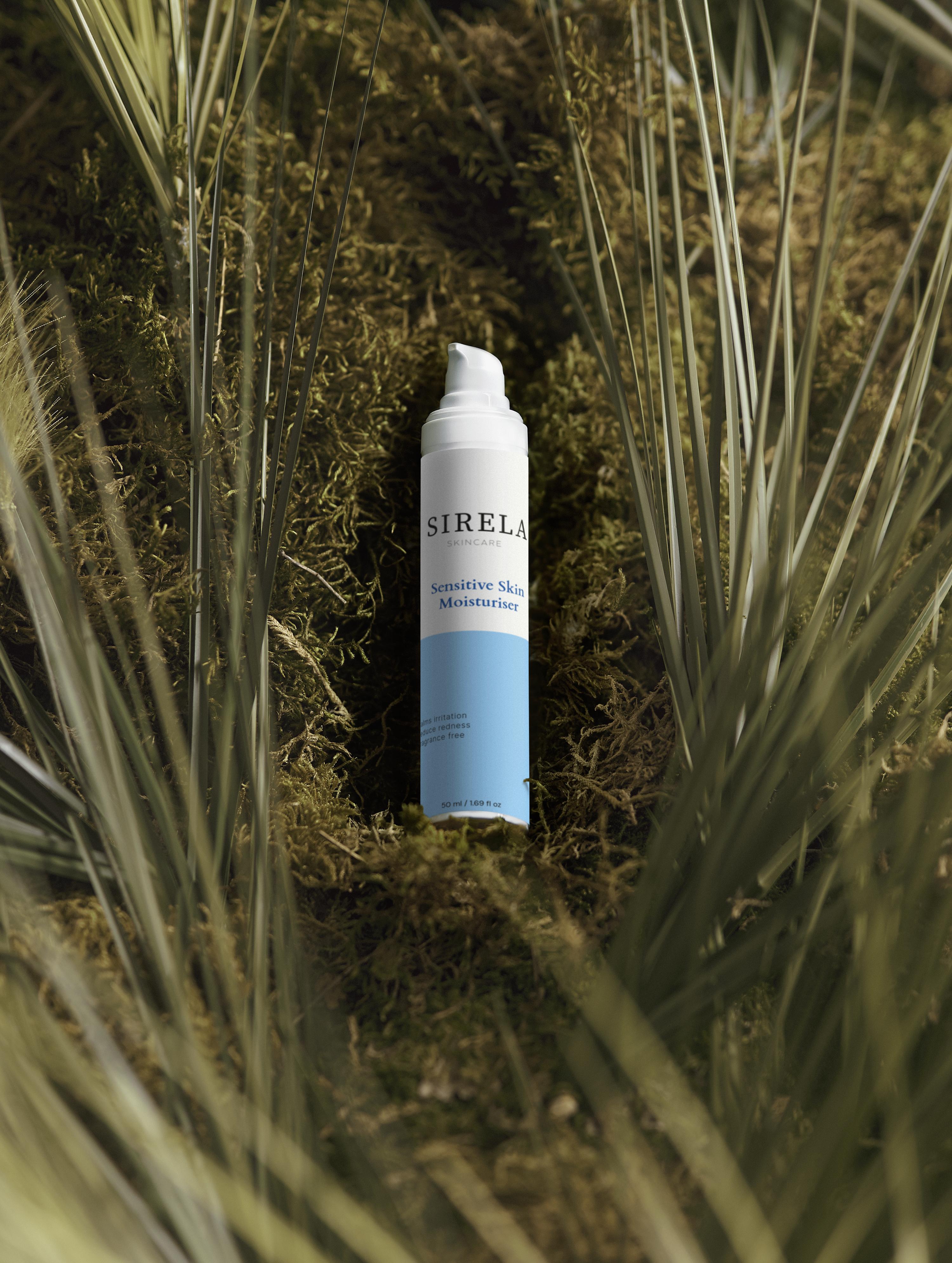 SIRELA skincare product on a natural background with grass and moss